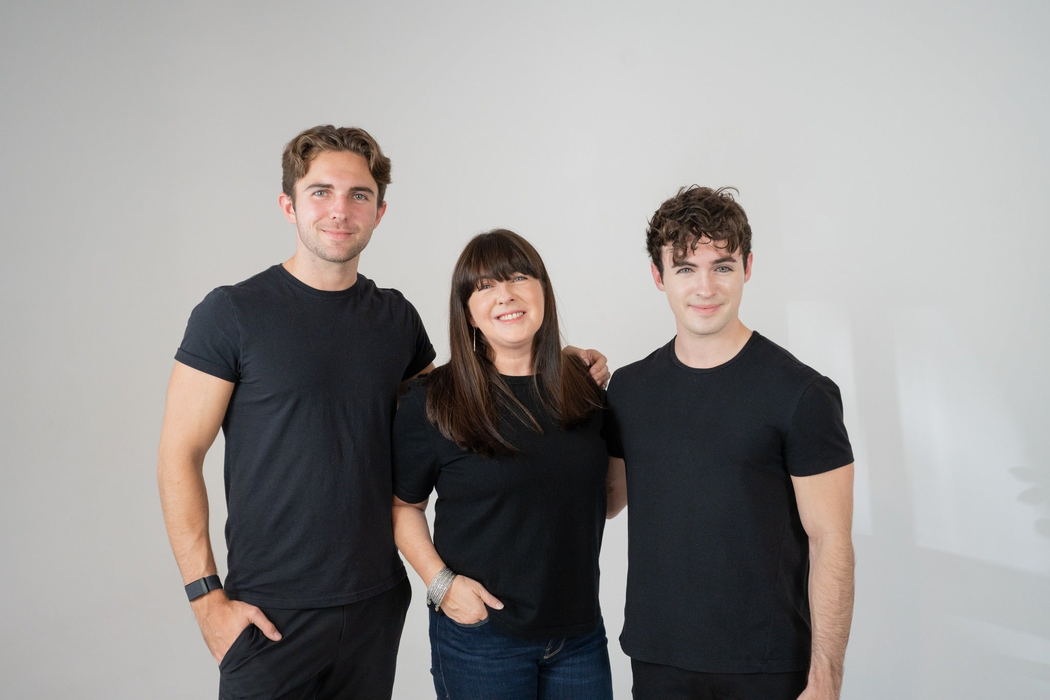 Founders of Seek® Caleb and Will standing with their mother who was the inspiration for Seek®