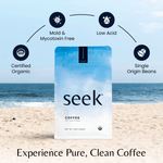 A bag of Seek® Mold-Free Coffee on a beach with icons highlighting Certified Organic, Mold & Mycotoxin Free, Low Acid, and Single Origin Beans.